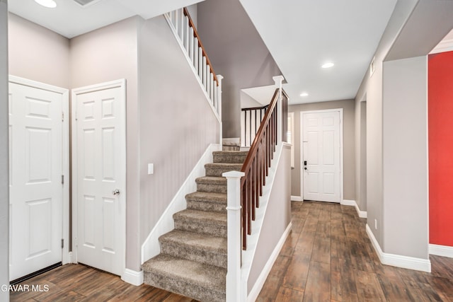 42638 Meridian Way, Lancaster, CA 93536 - entrance foyer featuring dark wood-style flooring, stairway, and recessed lighting