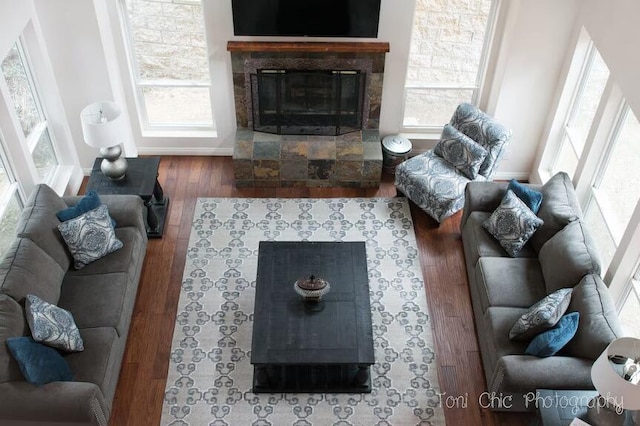 2100 Symonds Dr, Frazier Park, CA 93222 - living room featuring a tile fireplace, baseboards, and wood finished floors