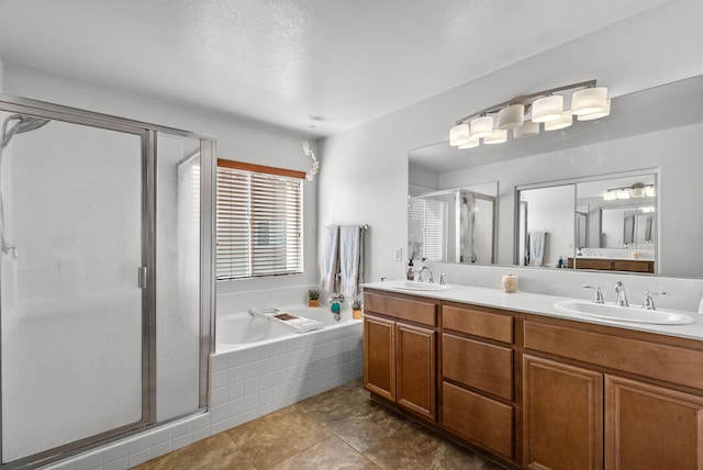 bathroom featuring separate shower and tub, tile patterned flooring, and vanity