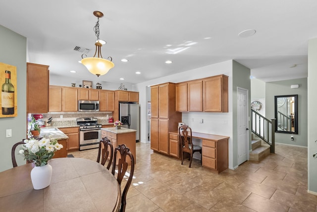 kitchen featuring pendant lighting, a center island, light tile patterned floors, appliances with stainless steel finishes, and tasteful backsplash