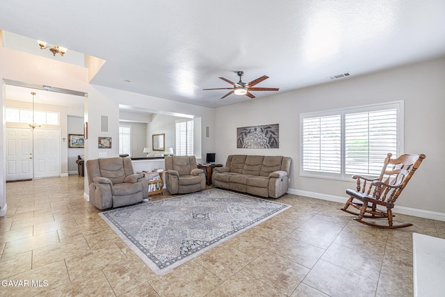 1776 Blackberry Ct, Palmdale, CA 93551 - living area with plenty of natural light, a chandelier, and ceiling fan