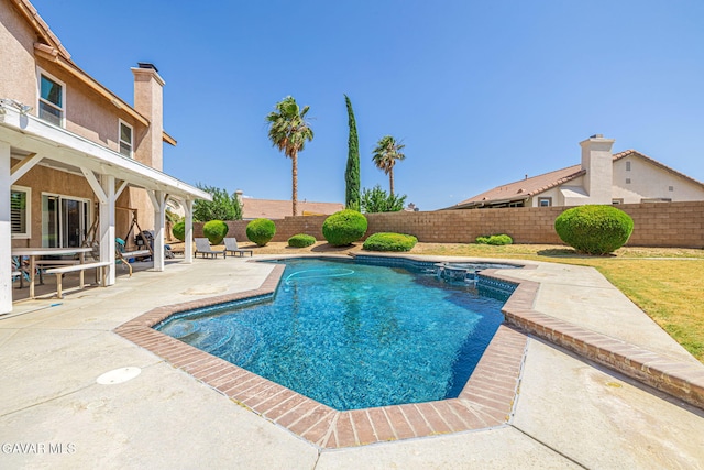 1776 Blackberry Ct, Palmdale, CA 93551 - view of swimming pool featuring a patio, a fenced backyard, and a pool with connected hot tub