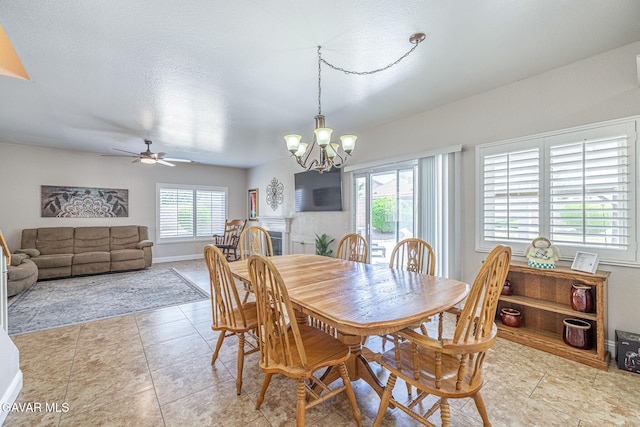 1776 Blackberry Ct, Palmdale, CA 93551 - dining room with a chandelier, ceiling fan, and light tile patterned flooring