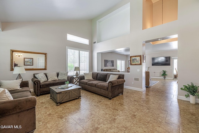 1776 Blackberry Ct, Palmdale, CA 93551 - living room with baseboards and high vaulted ceiling