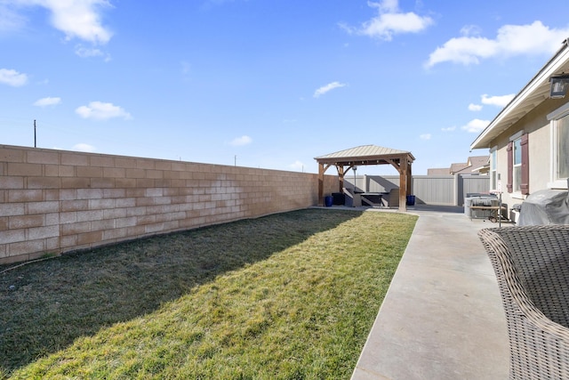 view of yard with a gazebo and a patio area