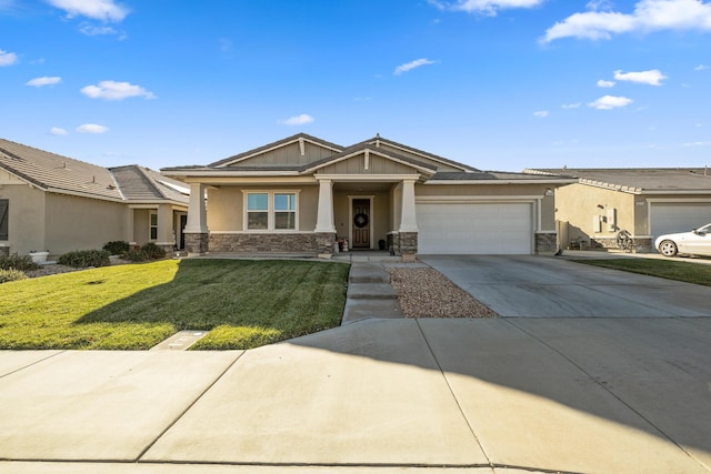 view of front of home with a garage and a front lawn