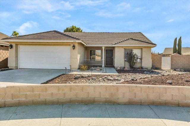 ranch-style home with a garage