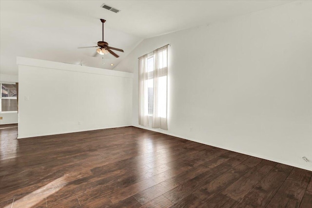 spare room with dark wood-type flooring, ceiling fan, and lofted ceiling