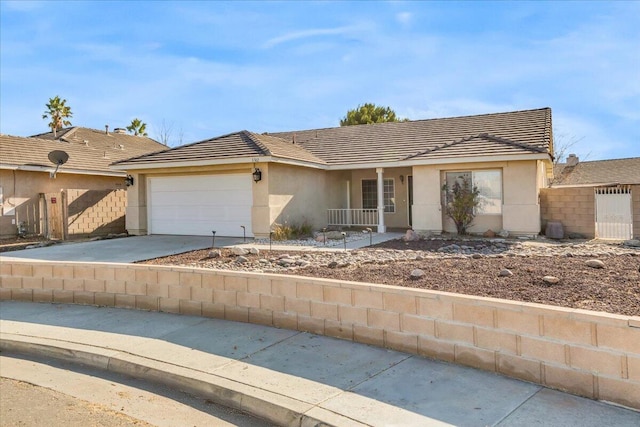 ranch-style home with a garage