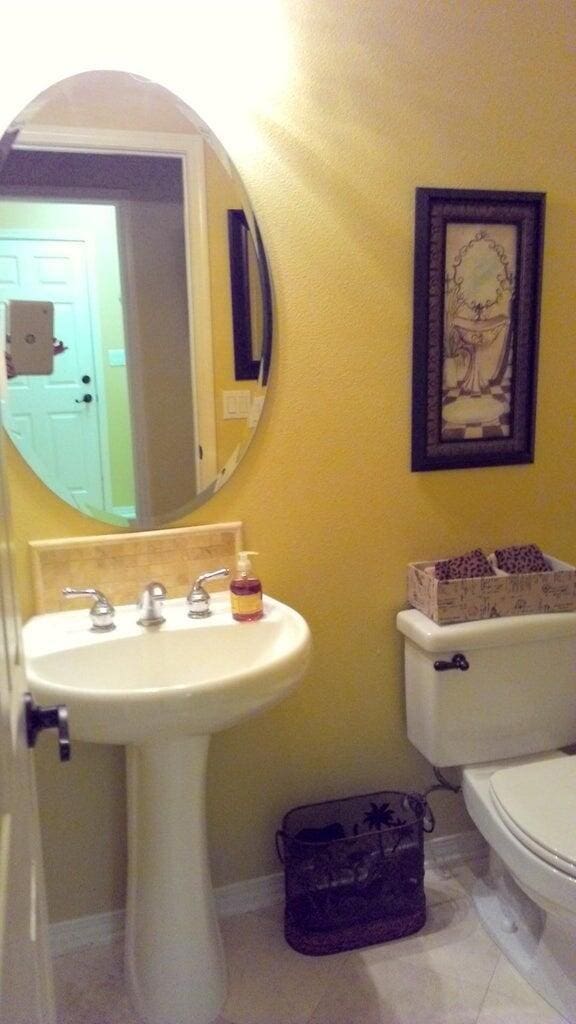 bathroom featuring toilet and sink