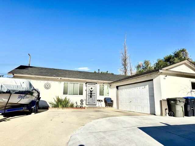 43744 Beech Ave, Lancaster, CA 93534 - ranch-style home featuring driveway, an attached garage, and stucco siding