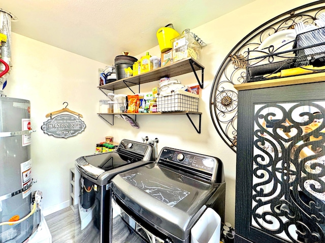 43744 Beech Ave, Lancaster, CA 93534 - washroom featuring secured water heater, separate washer and dryer, and wood finished floors