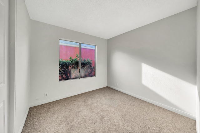 2820 S S Ave, Palmdale, CA 93550 - carpeted spare room featuring baseboards and a textured ceiling