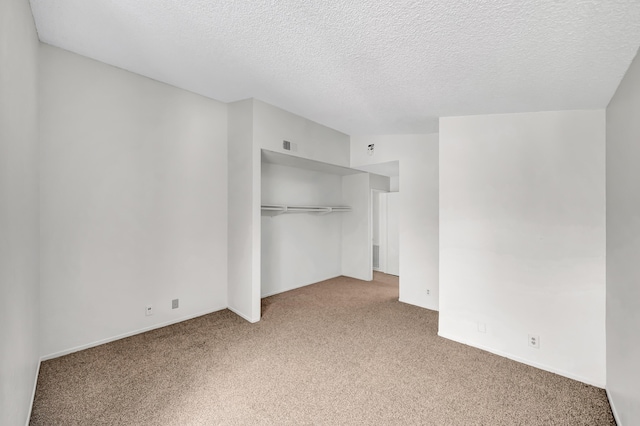 2820 S S Ave, Palmdale, CA 93550 - unfurnished bedroom featuring a closet, carpet flooring, a textured ceiling, and visible vents