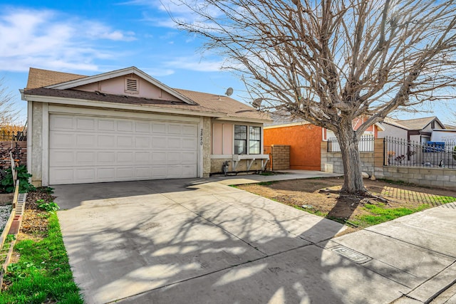 2820 S S Ave, Palmdale, CA 93550 - ranch-style house featuring driveway, stucco siding, fence, and an attached garage