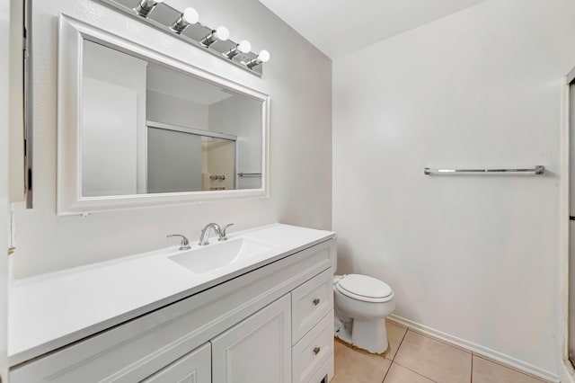 2820 S S Ave, Palmdale, CA 93550 - full bath with tile patterned floors, vanity, toilet, and a shower with shower door