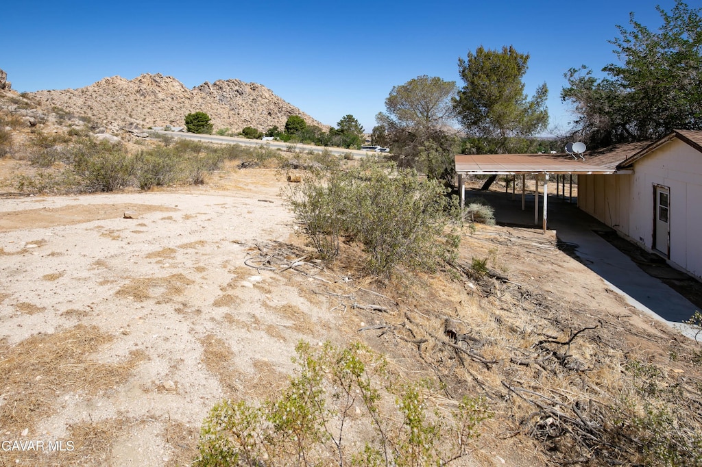 17613 Lakespring Ave, Lake Los Angeles, CA 93591 - view of yard with a mountain view