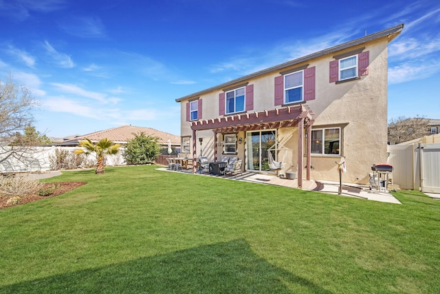 back of property with a patio, a fenced backyard, a yard, a pergola, and stucco siding