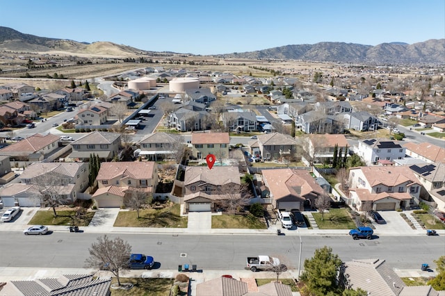 bird's eye view with a residential view and a mountain view