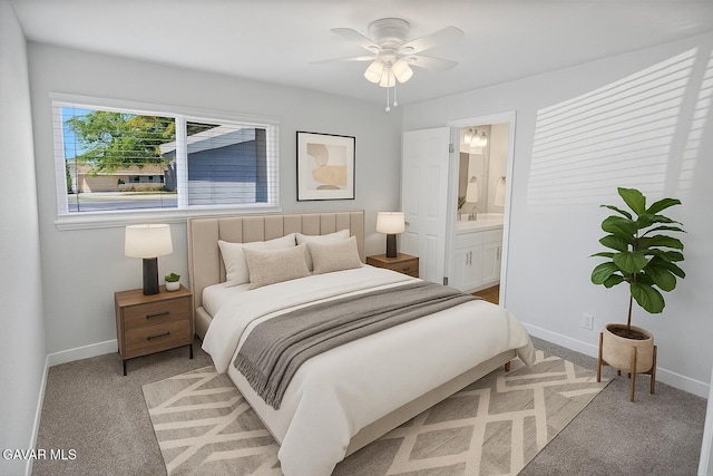 1109 W W Ave Unit J8, Lancaster, CA 93534 - bedroom with light carpet and ensuite bathroom