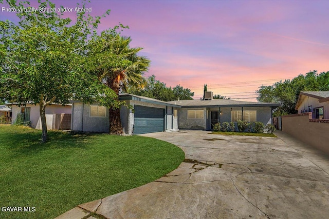 1109 W W Ave Unit J8, Lancaster, CA 93534 - view of front of house featuring an attached garage and concrete driveway