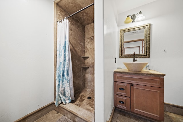 bathroom with a shower with curtain and vanity