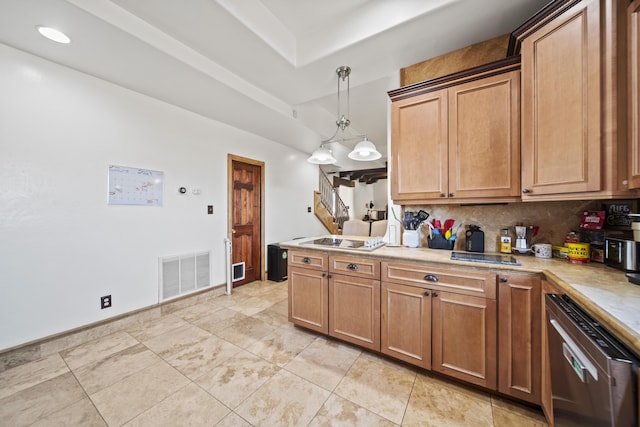 kitchen featuring dishwasher, pendant lighting, backsplash, and light tile patterned floors