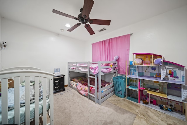 carpeted bedroom featuring ceiling fan