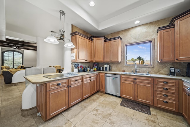 kitchen featuring kitchen peninsula, tasteful backsplash, stainless steel dishwasher, sink, and decorative light fixtures