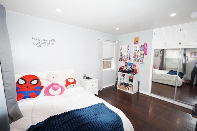 bedroom featuring baseboards, a closet, dark wood finished floors, and recessed lighting