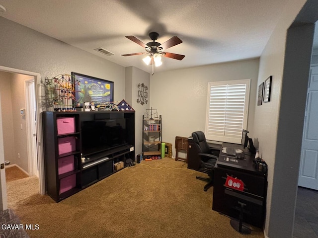 3309 W Brabham Ave, Rosamond, CA 93560 - carpeted office space featuring a ceiling fan