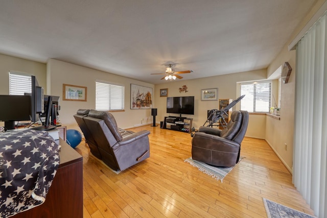 29948 Greenwater Dr, Tehachapi, CA 93561 - living area with ceiling fan and light wood-style flooring