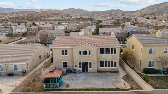 aerial view with a residential view and a mountain view