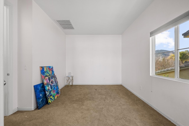 interior space featuring visible vents and baseboards