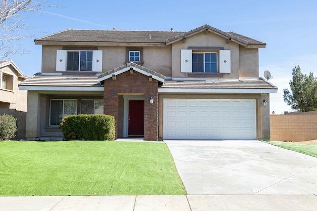 traditional-style house with driveway, a garage, a tiled roof, a front yard, and stucco siding