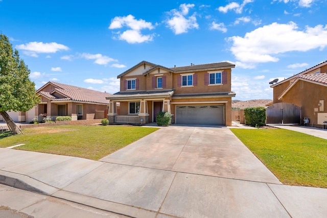 view of front of property with covered porch, a garage, and a front yard