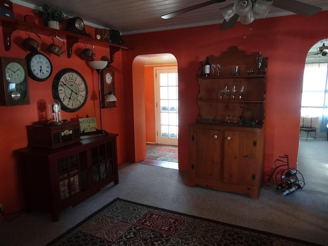 interior space with plenty of natural light and ornamental molding