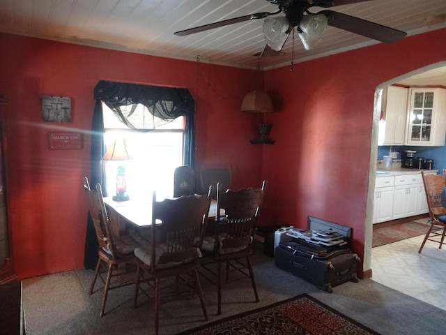 dining area with ceiling fan