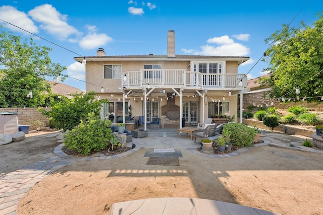 28314 Easton Ln, Saugus, CA 91350 - rear view of property with a patio, stucco siding, an outdoor living space, and a chimney