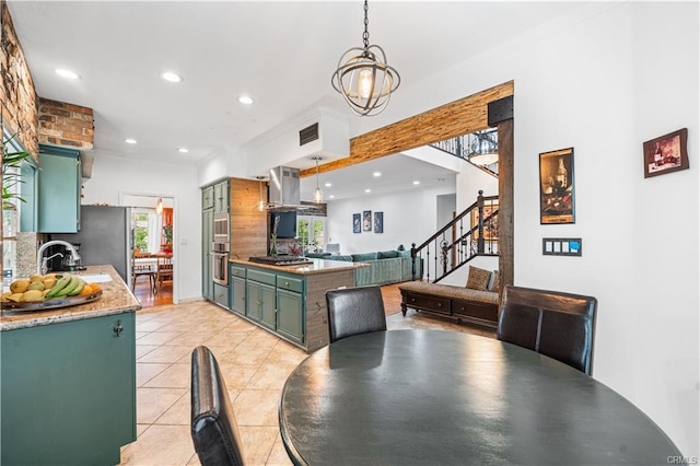 28314 Easton Ln, Saugus, CA 91350 - dining space with light tile patterned flooring, recessed lighting, and stairs