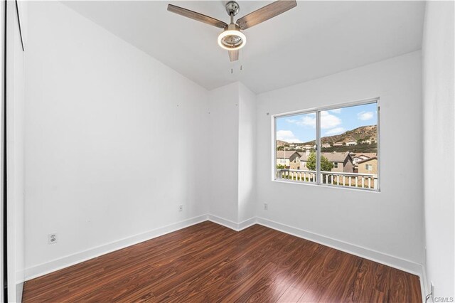 28314 Easton Ln, Saugus, CA 91350 - unfurnished room with dark wood-style flooring and a ceiling fan
