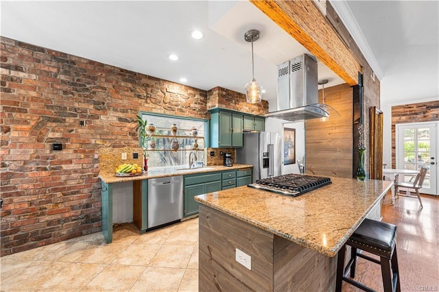 28314 Easton Ln, Saugus, CA 91350 - kitchen featuring green cabinetry, appliances with stainless steel finishes, island range hood, brick wall, and recessed lighting