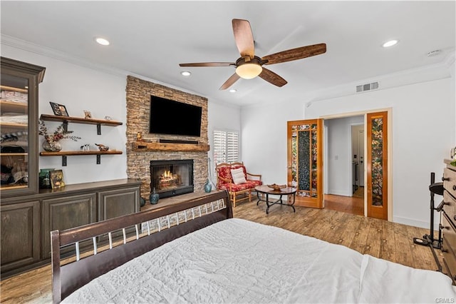 28314 Easton Ln, Saugus, CA 91350 - bedroom with wood finished floors, recessed lighting, a fireplace, crown molding, and ceiling fan