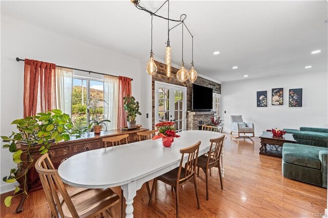 28314 Easton Ln, Saugus, CA 91350 - dining area with recessed lighting, light wood-type flooring, and ornamental molding
