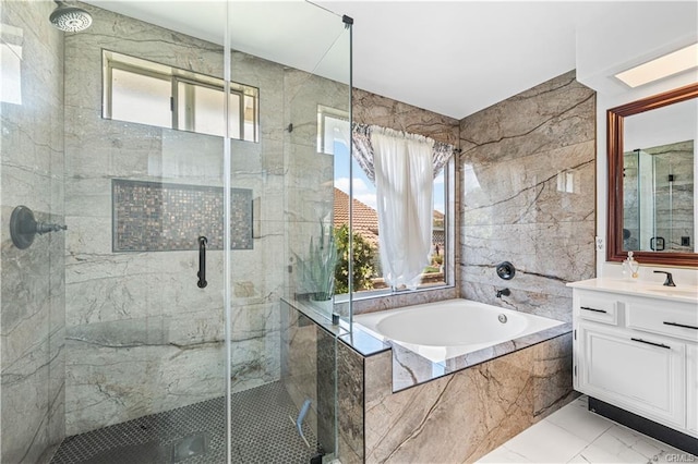 28314 Easton Ln, Saugus, CA 91350 - full bath featuring a garden tub, vanity, a marble finish shower, marble finish floors, and tile walls