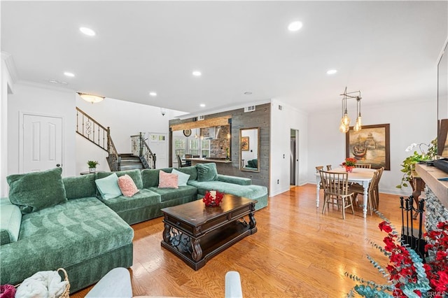 28314 Easton Ln, Saugus, CA 91350 - living area with crown molding, recessed lighting, stairway, and light wood finished floors