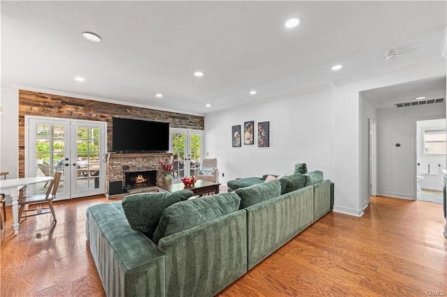 28314 Easton Ln, Saugus, CA 91350 - living room with french doors, recessed lighting, plenty of natural light, wood finished floors, and ornamental molding