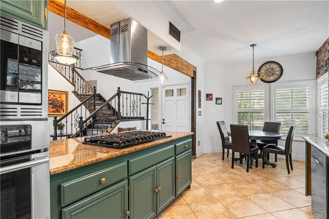 28314 Easton Ln, Saugus, CA 91350 - kitchen featuring green cabinets, island range hood, gas cooktop, oven, and decorative light fixtures
