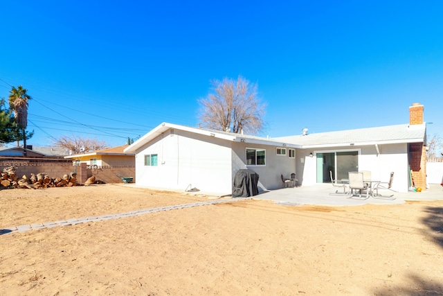 back of house featuring a patio area