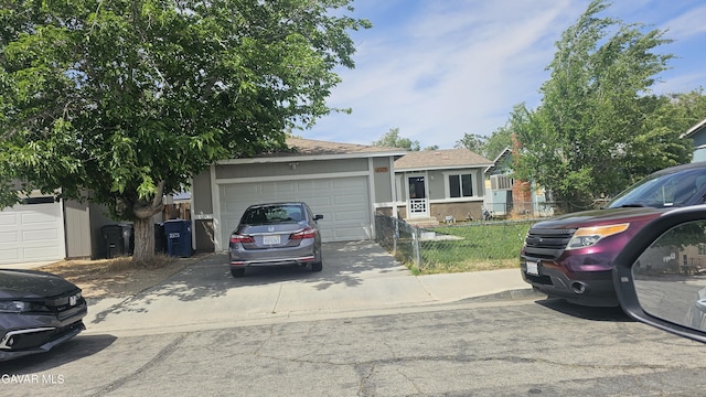 2325 E Pecos Ct, Lancaster, CA 93535 - view of front of property featuring driveway and a garage